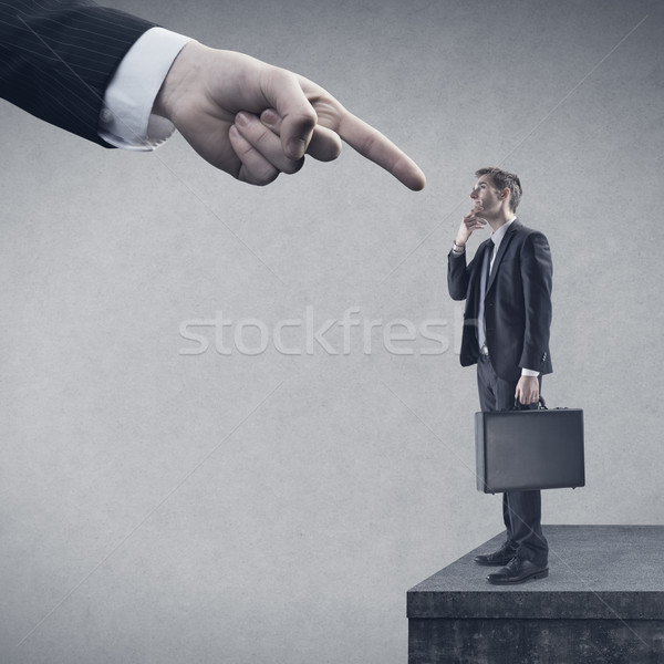 üzlet hatóság ujj mutat fiatal töprengő Stock fotó © stokkete