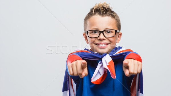 Funny superhero pointing at camera Stock photo © stokkete