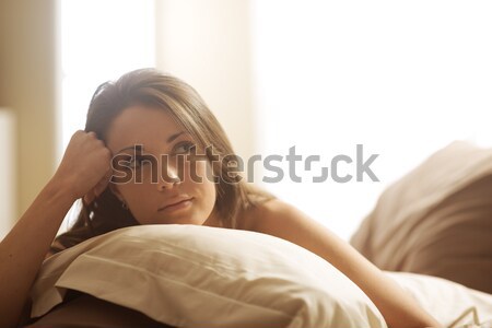 Relaxing on bed Stock photo © stokkete