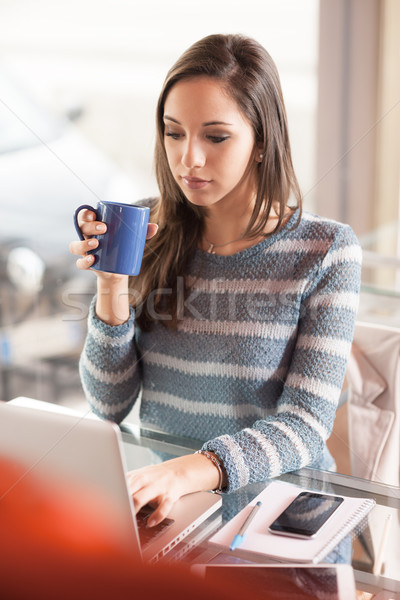 Stock photo: Smiling woman at work