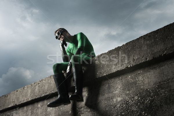 Pensive green superhero Stock photo © stokkete