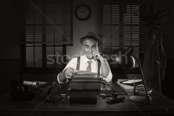 Confident journalist working late at night Stock photo © stokkete