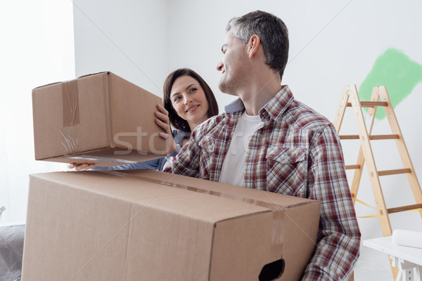 Couple moving into a new house Stock photo © stokkete