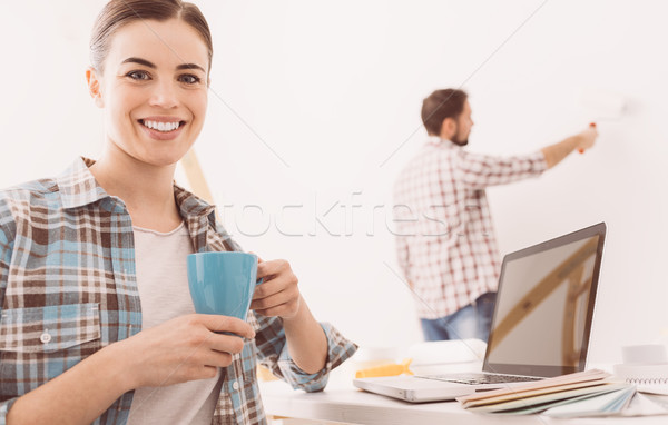 Couple renovating their house Stock photo © stokkete