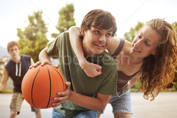 улице баскетбол два мальчики девушки играет Сток-фото © stokkete
