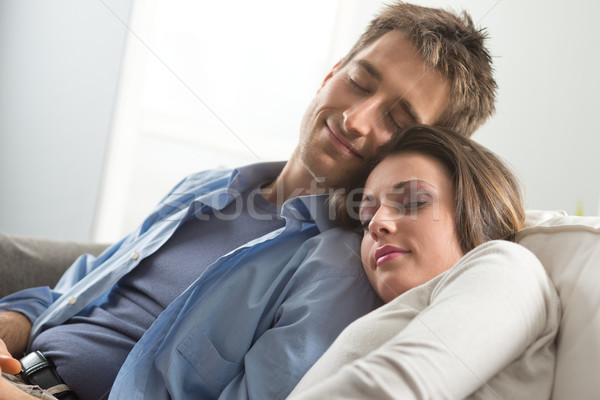 Couple sleeping on sofa Stock photo © stokkete