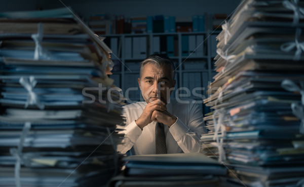 Business executive overloaded with work Stock photo © stokkete