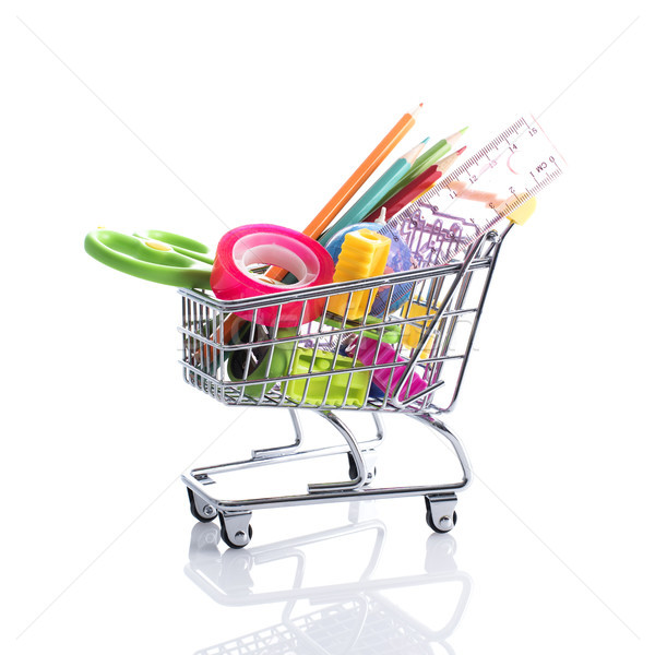 Stationery accessories in a shopping cart Stock photo © stokkete