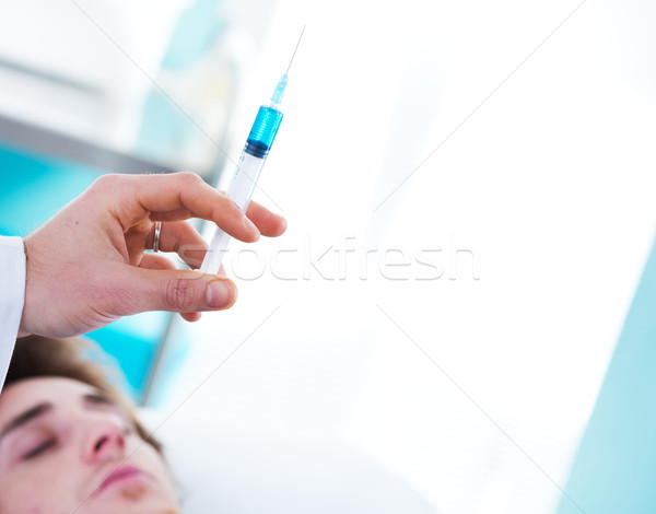 Injecting medication Stock photo © stokkete