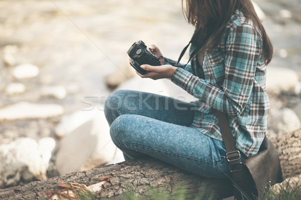 Female tourist with digital camera Stock photo © stokkete