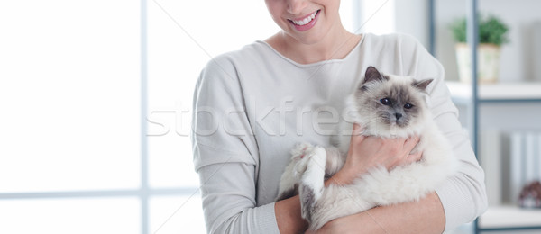 Glücklich Frau Haustier halten schönen weichen Stock foto © stokkete