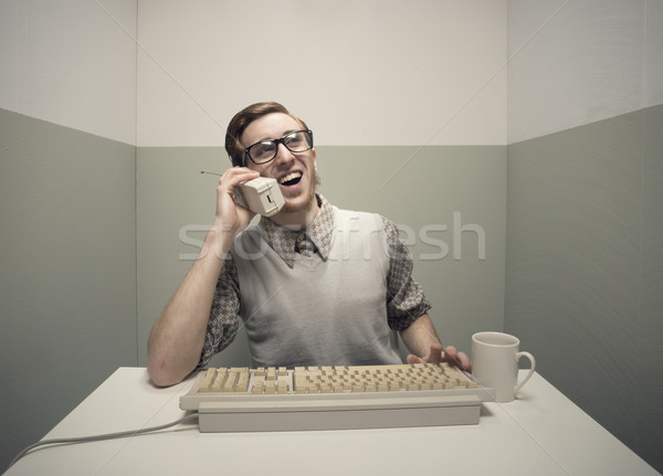 Nerd guy on the phone Stock photo © stokkete