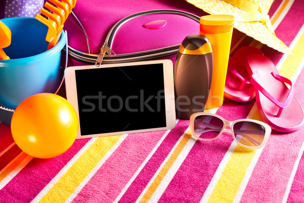 Vakantie tablet lege kleurrijk strandlaken Stockfoto © stokkete