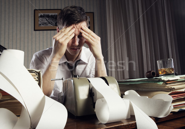Kimerült üzletember fáradt ül asztal tele Stock fotó © stokkete