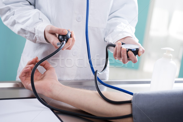Measuring blood pressure Stock photo © stokkete