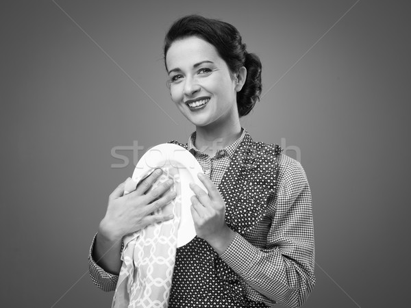 Vintage домохозяйка посуда улыбаясь блюдо ткань Сток-фото © stokkete