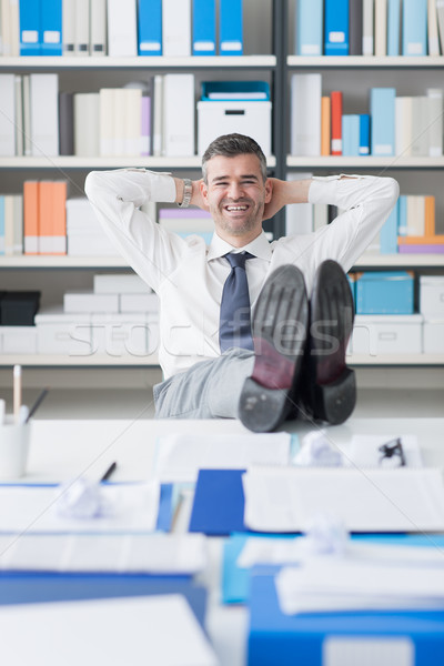 Lazy businessman in his office Stock photo © stokkete