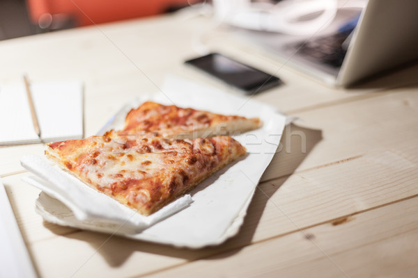 Sliced tasty pizza snack Stock photo © stokkete