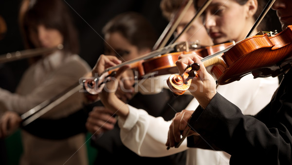 [[stock_photo]]: Symphonie · orchestre · stade · sombre · femme