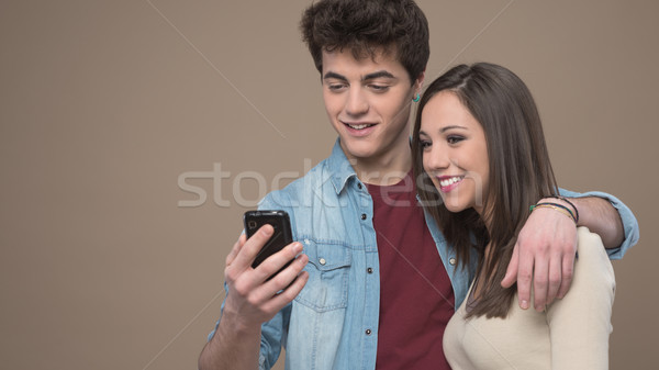 Stockfoto: Vrolijk · mobiele · telefoon · jonge · teen · glimlachend