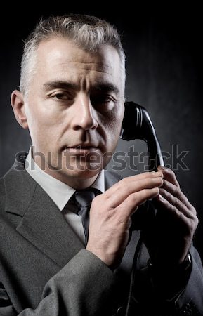 Cool undercover agent with gun Stock photo © stokkete