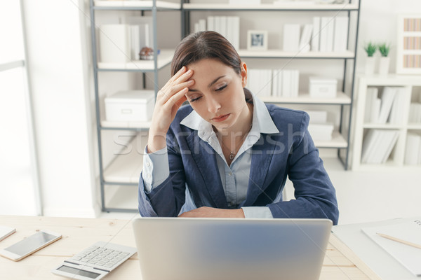 Stock photo: Exhausted businesswoman in the office