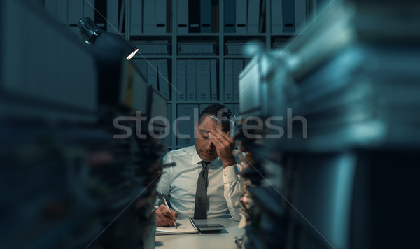 Business executive overloaded with work Stock photo © stokkete