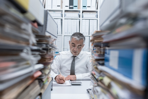 Manager overloaded with work Stock photo © stokkete