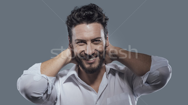 Cheerful man relaxing Stock photo © stokkete