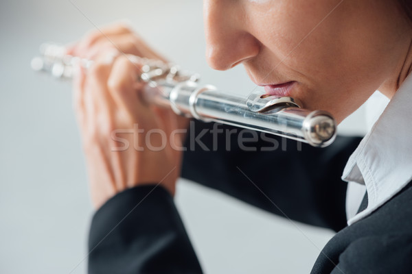 Professional flutist solo player Stock photo © stokkete