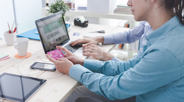 Stock photo: Married couple shopping online at home