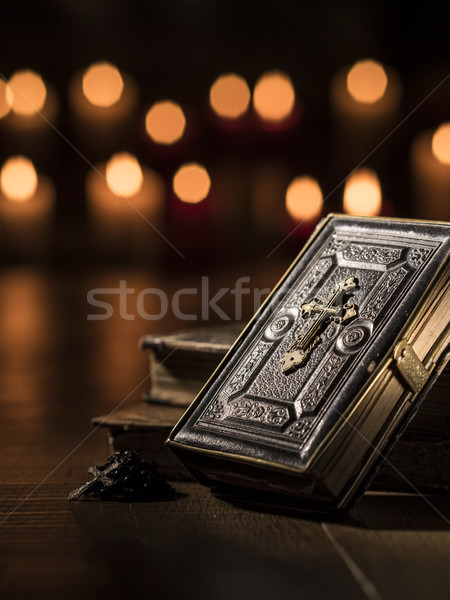 Antique precious Bible and Holy rosary in the Church Stock photo © stokkete