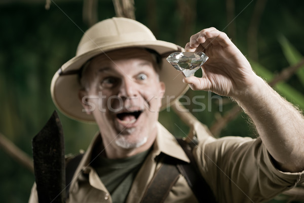 Explorer finding a huge gem in the jungle Stock photo © stokkete