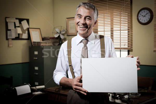 Mosolyog klasszikus üzletember tart üres tábla derűs Stock fotó © stokkete