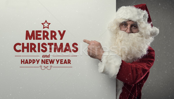 Santa Claus wishing you a Merry Christmas Stock photo © stokkete