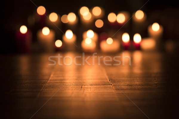 Lit candles burning in the Church Stock photo © stokkete