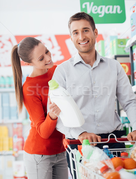 Happy couple shopping at the store Stock photo © stokkete