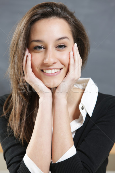 Close-up of a young woman smiling  Stock photo © stokkete