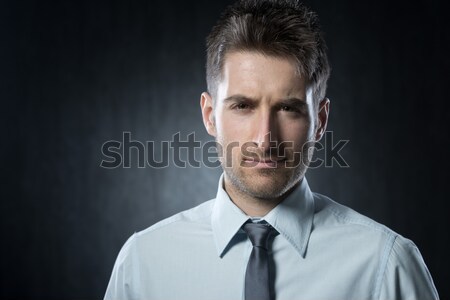 Képzelet fiatalember csukott szemmel fókuszált gondolkodik üzletember Stock fotó © stokkete