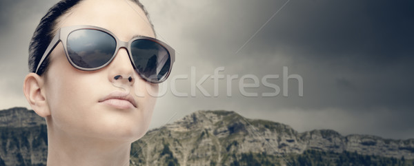 Young fashion model with sunglasses Stock photo © stokkete