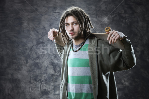 Kaykaycı portre genç adam kaykay erkek Stok fotoğraf © stokkete