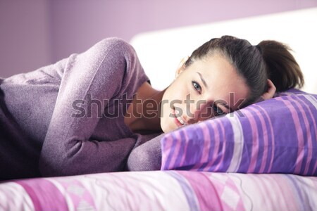 Close-up of an attractive young female sleeping in bed at home Stock photo © stokkete