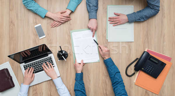 Stock photo: Couple signing a contract