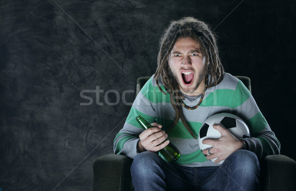 Watching soccer on tv Stock photo © stokkete