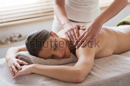 Relaxing back massage at spa Stock photo © stokkete