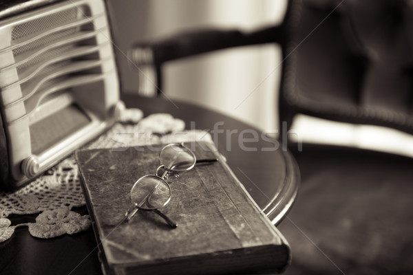 Vintage interior with old radio and book Stock photo © stokkete