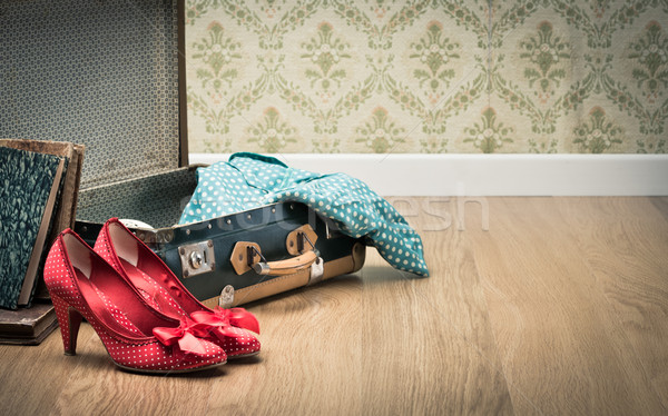 Stock photo: Glamour woman packing