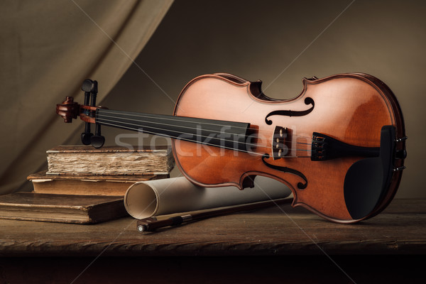 Stock photo: Old violin still life with books
