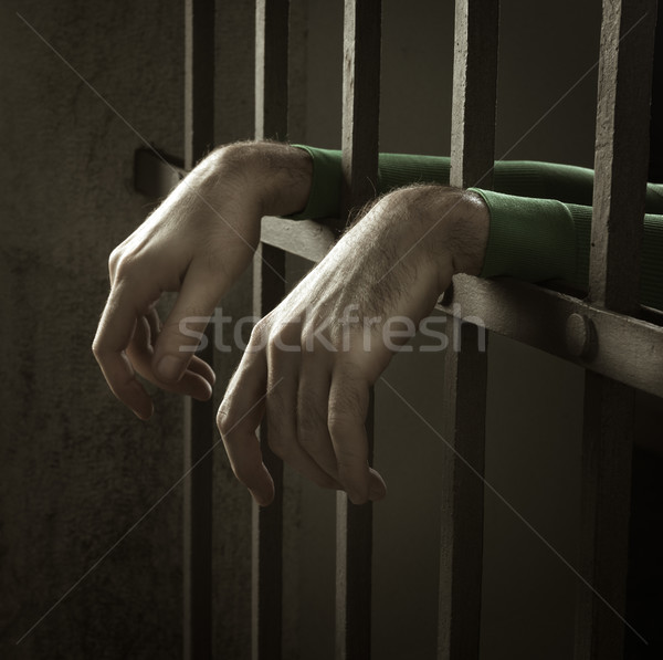 Człowiek więzienia ręce depresji rozpacz Zdjęcia stock © stokkete