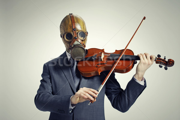 üzletember gázmaszk hegedű zene portré maszk Stock fotó © stokkete